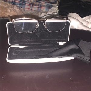 Clear colored Versace reading Glasses.